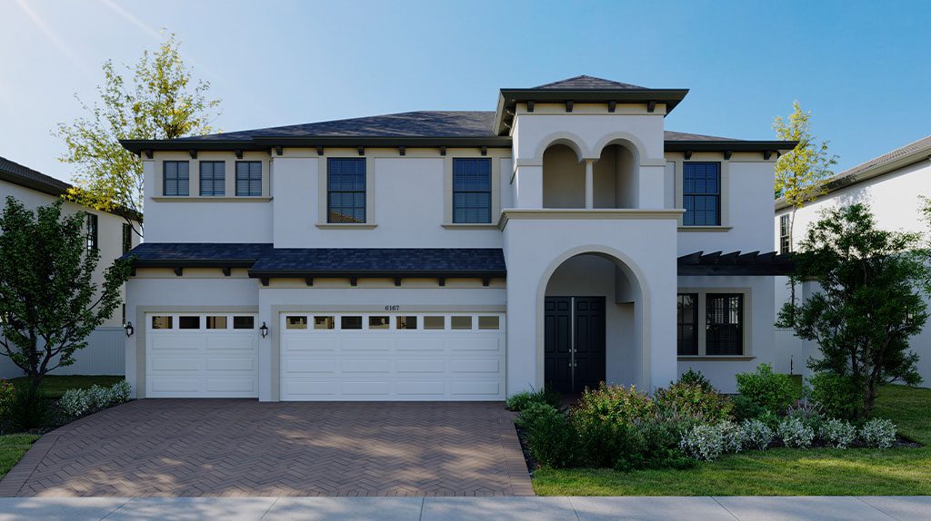Two-story house with light-colored facade, dark roof, and a double garage. It has an arched entryway, two garage doors, and is surrounded by greenery and a brick driveway.
